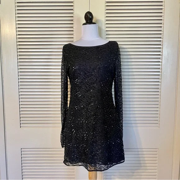 long sleeve backless sequin mini dress Gold Sequin Long Sleeve Backless Mini Dress – éloges main image 1